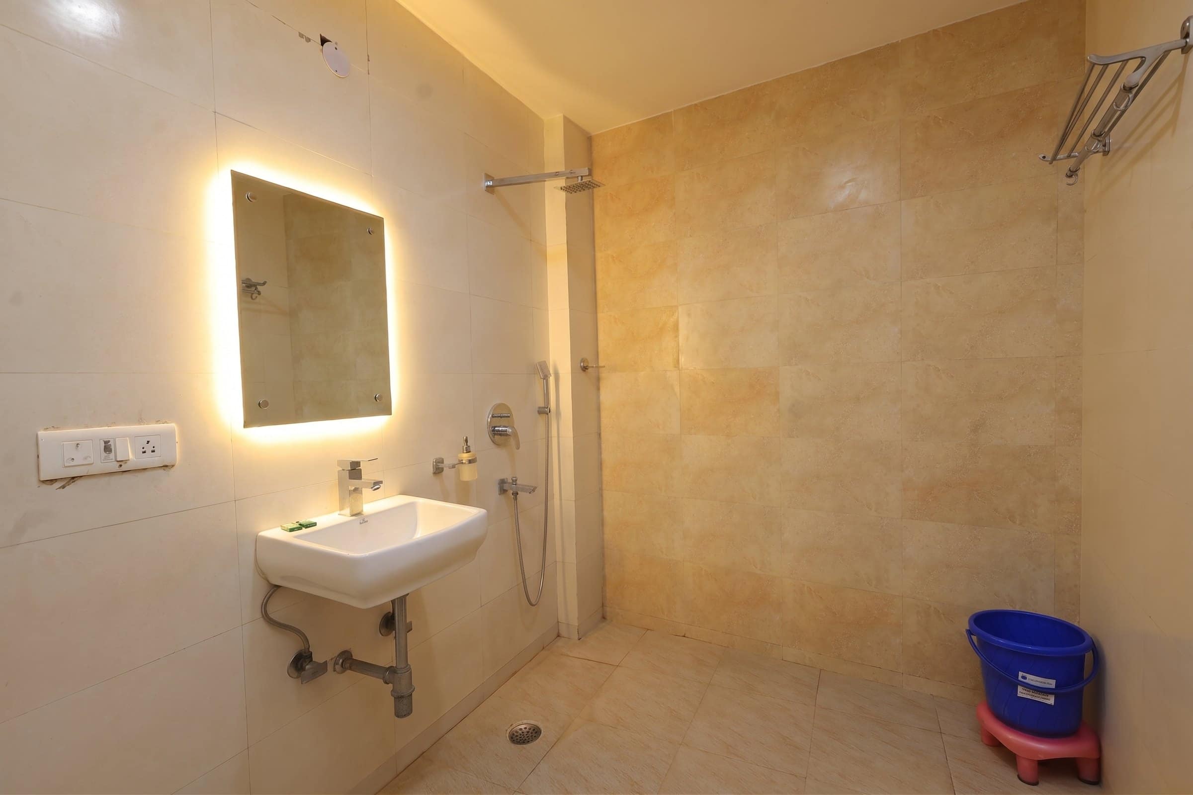 A bathroom with a shower area
