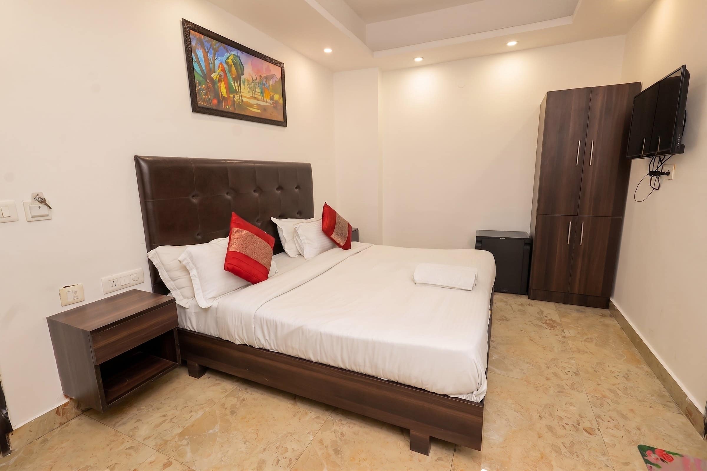 An interior room made up with two pillows