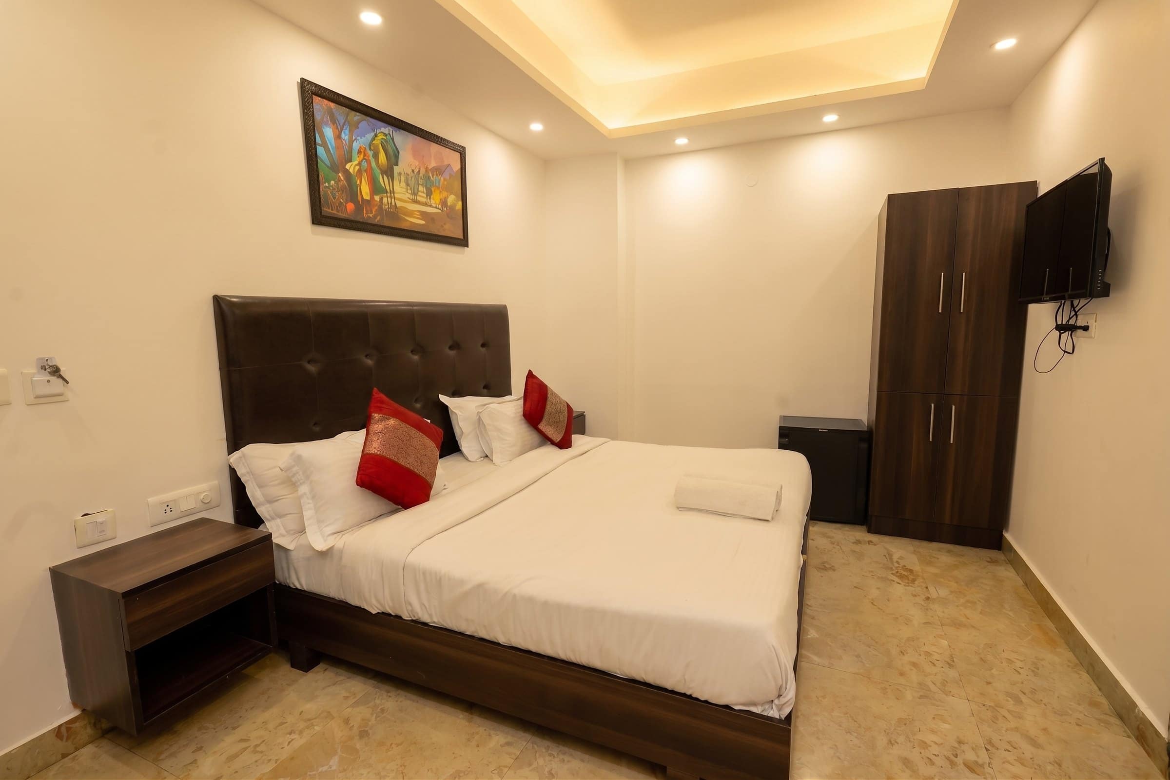 An interior room with a wardrobe and TV