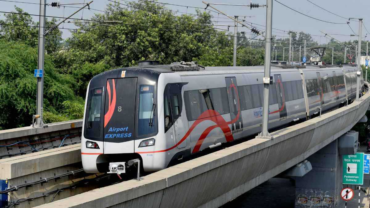 An Airport Express train on the elevated Orange Line in Delhi